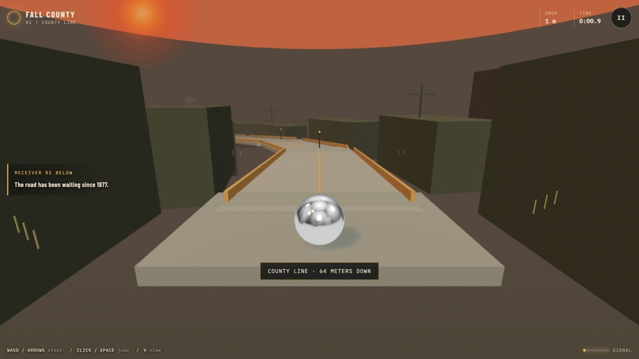 Chrome sphere on a lamp-lined Fall County road enclosed by buildings beneath a Midwestern sunset